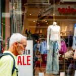Nederlandse economie groeit licht, huishoudens verminderen uitgaven