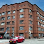 Billitongebouw in Den Haag wordt omgevormd tot luxe woningen met oplevering in 2026