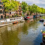 Amsterdamse gemeenteraad heeft onvoldoende controle over stadsinvesteringen, volgens Algemene Rekenkamer