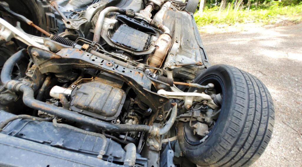 Auto kantelt op oprit A10 Noord in Amsterdam; geen gewonden gemeld