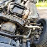 Auto kantelt op oprit A10 Noord in Amsterdam; geen gewonden gemeld