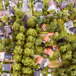 Column Johan Conijn: Klimaatadaptatie is essentieel voor woningcorporaties in Nederland