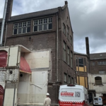 Transformatie van oude Ambachtsschool in Sittard naar 74 huurappartementen gestart