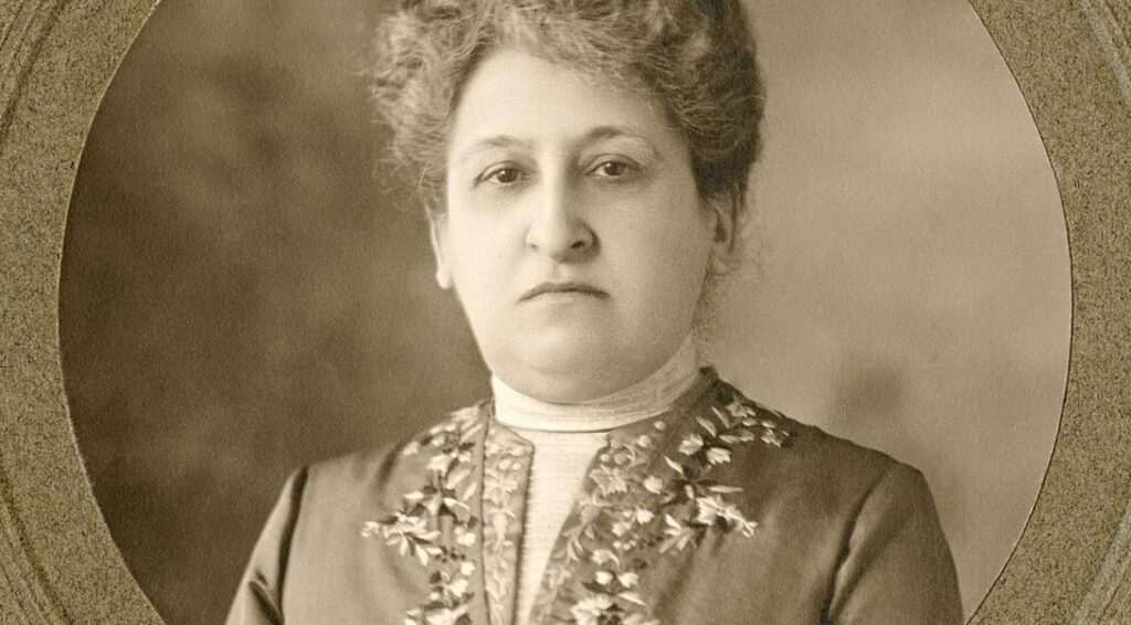 Portret van Aletta Jacobs in sepia.