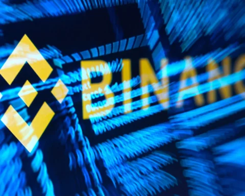 Binance-logo op een scherm met blauwe digitale strepen op de achtergrond.