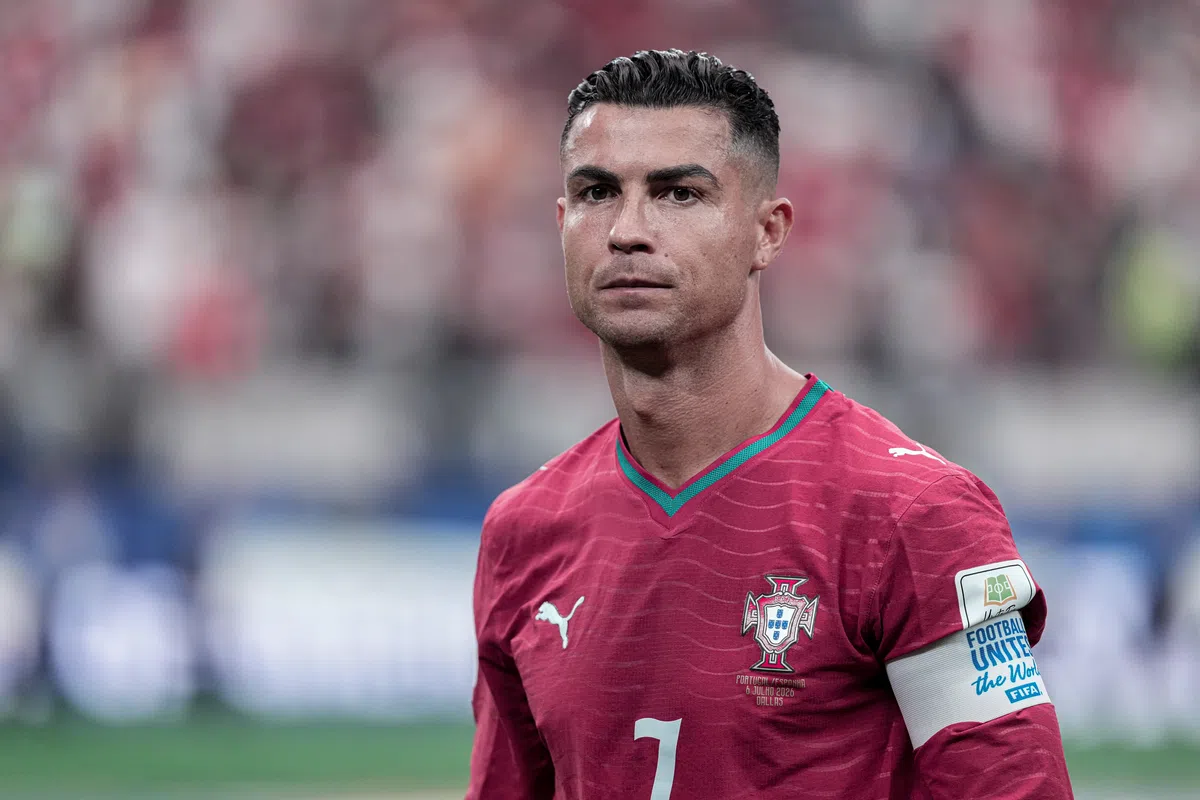 Cristiano Ronaldo wearing a Portugal football jersey during a match.